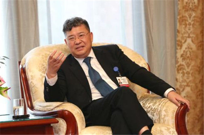 张玉良身价多少亿 62岁张玉良连任绿地董事长