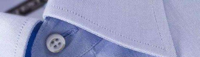 为什么衬衣最上面的扣眼是横向的?