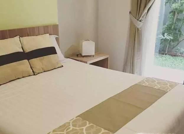 为啥酒店的床尾要放一块布?