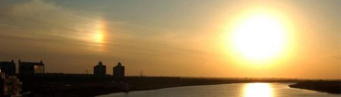 天空出现两个太阳的幻日现象是怎么形成的?