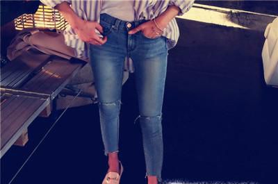 破洞牛仔裤的制作过程