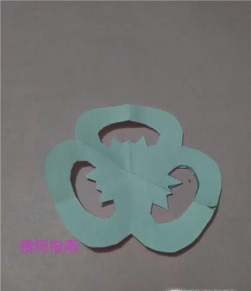 儿童趣味手工剪纸----三瓣花的折剪方法