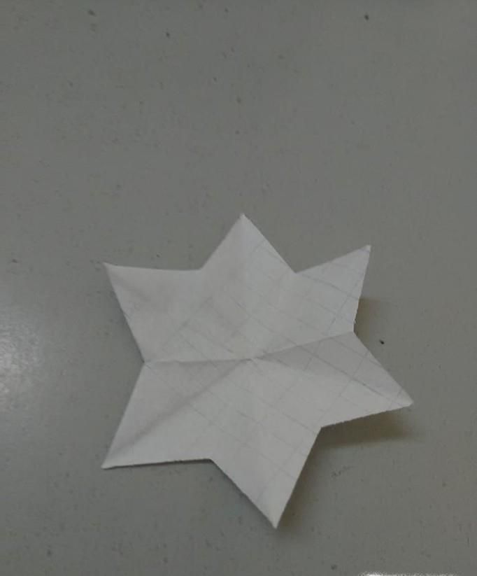 剪纸的基本折叠方法之六角星折法