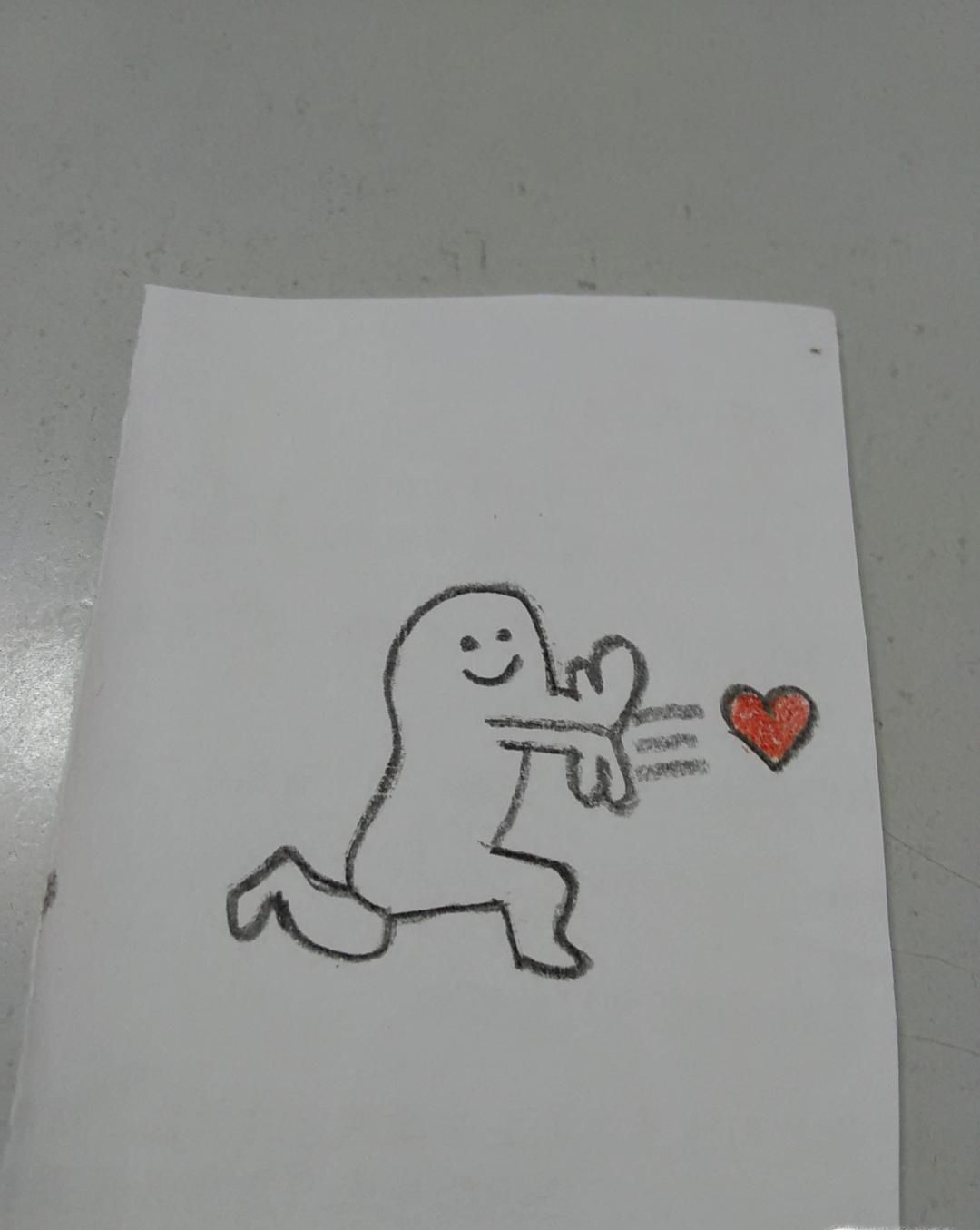 发射爱心小人纸上画法